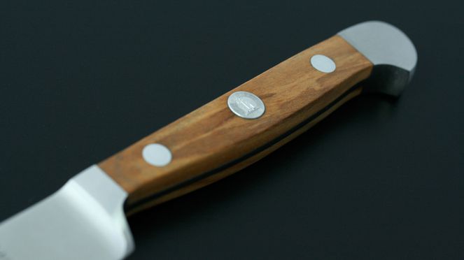 
                    detail of the handle of the vegetable knife olive