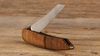 
                    Swiss pocketknife walnut unfolded made by sknife Biel