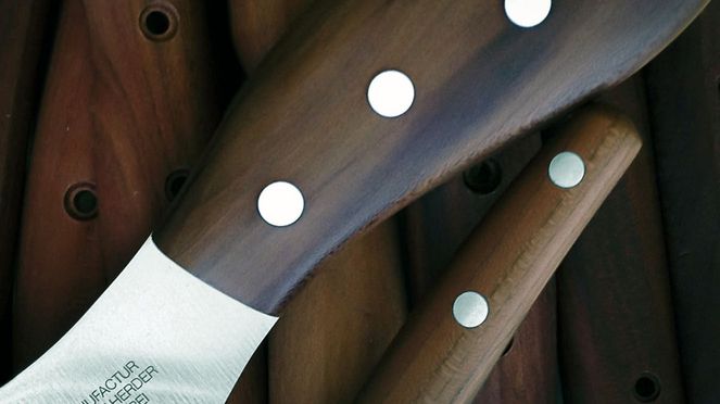 
                    Universal cheese knife with plum wood handle