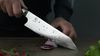 
                    Kiritsuke with precision sharpener with the most popular knife shape of the Kiritsuke
