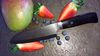 
                    The Kyocera Black Santoku with fruits